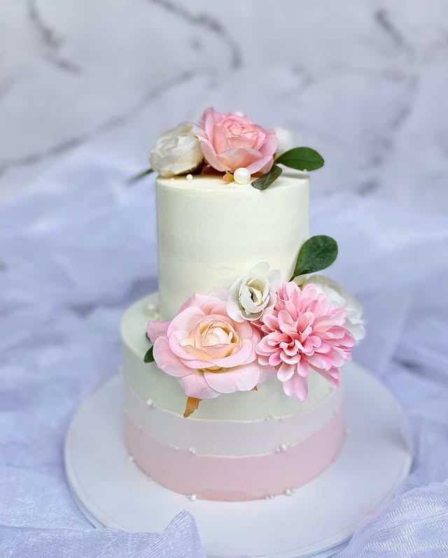 Claro Bakehouse tiered wedding cake with sugar flowers, Delhi NCR